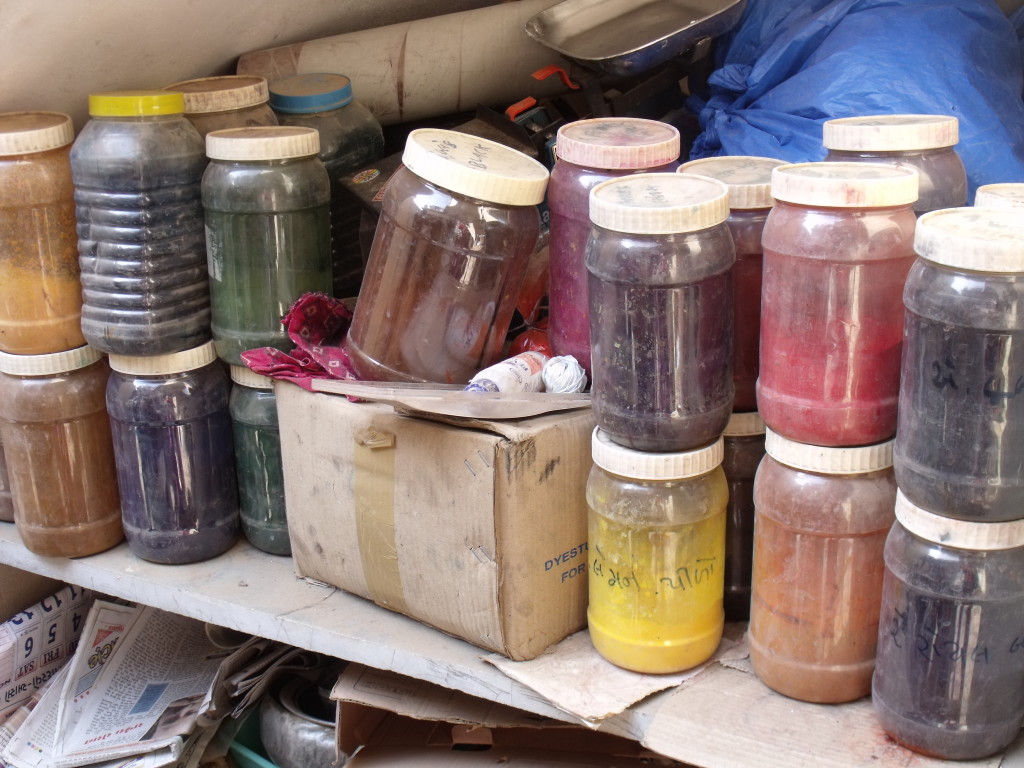 The shelf of dyes in Abduljabbar's workshop