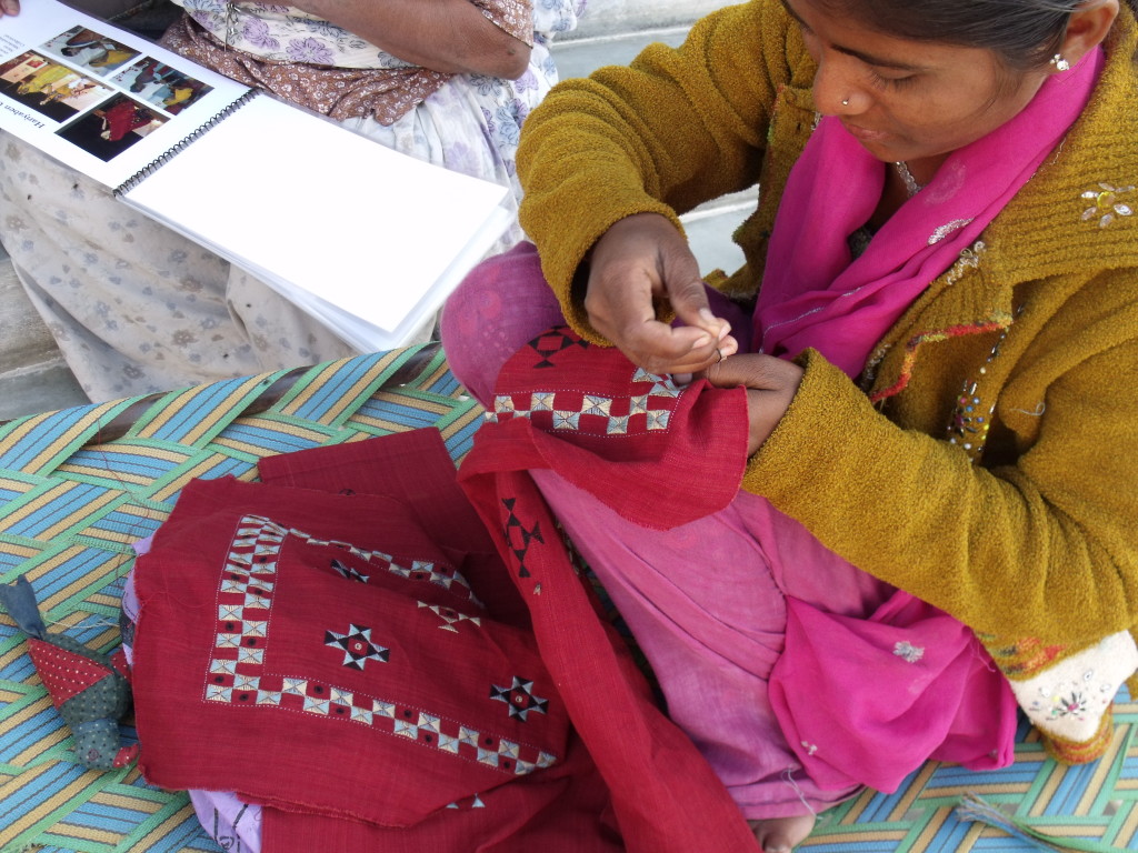 A Kala Raksha Vidhyalaya student doing suf embroidery