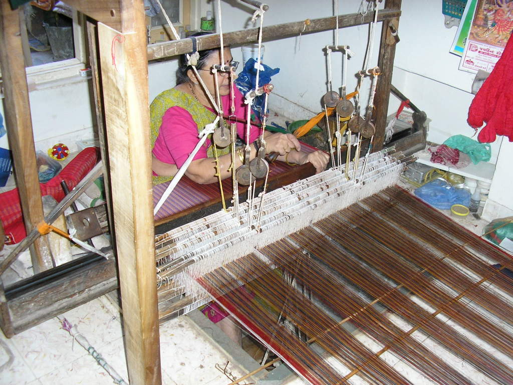 A lady of the Salvi family at her loom in 2008